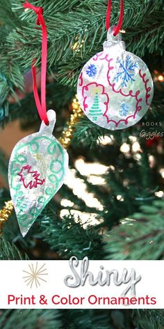 two ornaments hanging from a christmas tree with the text free shiny print and color ornaments