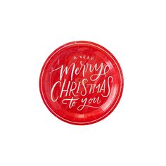 a red frisbee with the words merry christmas to you written in white on it