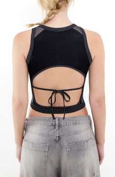 This cool cropped tank is crafted in a close-fitting silhouette with a tied-and-cutout back. 15" length (size Medium) Ties at back Crewneck Sleeveless 38% polyester, 35% recycled polyamide, 21% polyamide, 6% elastane Machine wash, line dry Made in Turkey Rollerball Perfume, Favorite Daughter, Platform Slippers, Maternity Shops, Designer Clothes For Men, Modern Outfits, Women's Summer Fashion, Black Fits, Athletic Women