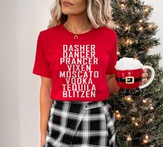 Drinking Christmas T-Shirt, Funny Holiday Party Shirt, Dasher Dancer Prancer Moscato Vodka Tequila Blitzen Shirt, Christmas Cocktail Shirt BLACK TEXT is used for White and Soft Cream Shirts. Other colored shirts have white text. F I T ∙ & ∙ S I Z I N G : -->Women's sizes are narrower than the waist. -->Sleeves are rolled up in some product pictures. They do not come rolled up on delivery. T I M E ∙ T O ∙ D E L I V E R Y : -->Processing and production time is 1-2 business days. I M P O R T A N T ∙ P L E A S E ∙ R E A D ∙ F U L L Y : --> Order cancellations are accepted for 2 hours after purchase. -->For any questions, please contact me directly. It's my pleasure to assist you. Orders placed till 12 noon are shipped the next business day and those placed after 12 noon are shipped the followi Funny Christmas Shirts For Women Nobull Woman Apparel, Funny Holiday Shirts Zazzle, Funny Bestfriend Christmas Shirts, Christmas Humor Tshirts, Rude Christmas Shirt, Wine Christmas Shirts, Cream Shirts, Christmas Cocktail, Cream Shirt