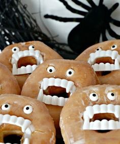 some donuts with fake teeth and mouths on them