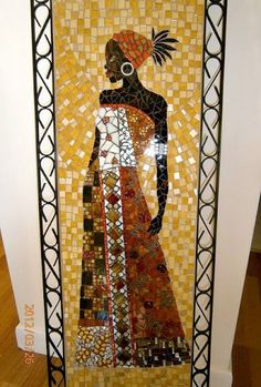 an art piece made out of mosaics and glass with a woman standing on it