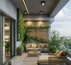 a balcony with couches, tables and plants on it