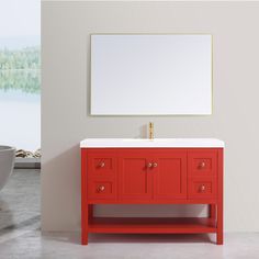 a bathroom vanity with a mirror above it