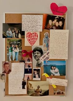 a bulletin board with pictures and hearts on it