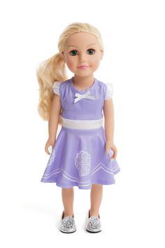 a doll with blonde hair wearing a purple dress and white shoes, standing on a white background