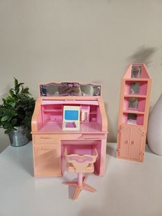 a doll house desk and chair with pink furniture