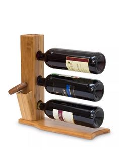 a wooden wine rack holding three bottles of wine