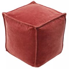 a red velvet square poufce on a white background