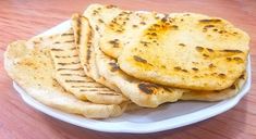 some pita bread on a white plate