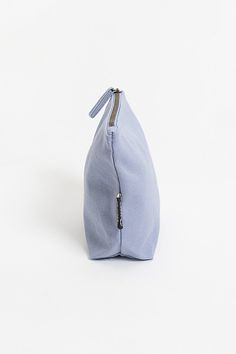 If you’ve been looking for an eco-friendly makeup bag to tame and organize cosmetic items, consider the simple and affordable Lok Pouch. Made from sustainably grown organic cotton canvas, the Lok Pouch’s dimensions (7" X 9" x 3" ) are large enough to accommodate most cosmetic containers and accessories but small enough to easily toss into a larger tote or pack. It has a 7-inch zippered opening with a long pull and a gusseted bottom panel, so it stands up on the countertop for easy access. Content + Care Made with 14-oz Certified Fairtrade Organic cotton canvas Long pull zipper YKK lead-free antique finish metal zippers and fasteners Spot clean with a soft damp cloth and dry it Machine wash separately in cold water Line dry or use low setting in dryer Do not use bleach; do not dry clean Mad Urban Outfitters Makeup Bag, Eco Friendly Makeup, Pinterest Contest, Sustainable Bag, Cosmetic Items, Cosmetic Containers, Zippered Pouch, Large Tote Bag, Antique Finish