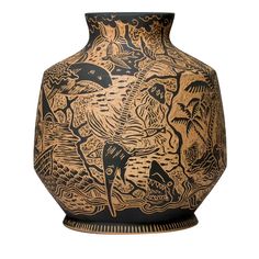 a black and gold vase with an image of dolphins in the water on it's side