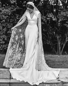 black and white photograph of woman in wedding dress