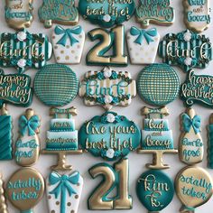 decorated cookies are arranged in the shape of numbers and balloons for 21st birthday party decorations