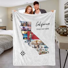 a man and woman holding up a white blanket with the state of california on it