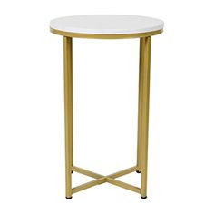 a white table with gold legs and a round top on a white background for use as a side table