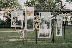 an outdoor ceremony setup with pictures and flowers