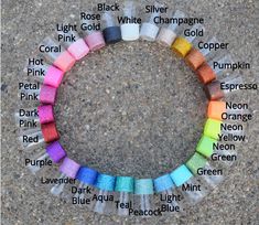 a circle made up of different colored crayons with the names of each color