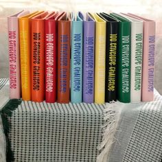 a stack of books sitting on top of a table