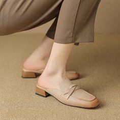 Shoes For Flying Step into comfort and style this summer with our chic Leather Mules. Perfectly designed for the office lady who loves to blend professionalism with a dash of casual flair, these slippers are a must-have for your warm-weather wardrobe. Crafted from high-quality genuine cow leather, these mules are a testament to durability and elegance. The low square heel provides just the right amount of lift, ensuring comfort throughout the day. Features Material: Premium genuine cow leather upper and pigskin lining ensure your feet stay comfortable and breathable. Heel: A modest 3cm square heel adds the perfect amount of height without sacrificing comfort. Design: Sleek, shallow-cut mules with a solid pattern and retro style, ideal for a variety of occasions. Season: Specially designed Elegant Slip-on Slippers With Round Toe, Leather Slip-ons For Formal Summer Wear, Spring Leather Open Toe Slip-ons, Beige Leather Sole Slip-ons For Work, Formal Beige Slip-ons For Spring, Classic Round Toe Slip-ons For Spring, Elegant Summer Slip-ons With Round Toe, Chic Beige Almond Toe Slip-ons, Trendy Clogs With Textured Footbed For Spring