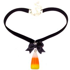 "This spooky cute Candy Corn Black Velvet Choker Necklace the perfect handmade jewelry piece for the autumn season! A perfect charm jewelry gift for any woman in your life or even yourself! This kawaii charm Necklace features a super realistic resin candy corn charm that hangs below your choice of a cute bow black bow or keep it plain without your choice!  Matching Candy Corn earrings also available in my shop>> http://fatallyfeminine.etsy.com Materials and Measurements: -Resin Charm -Charm is about 1\" long (2.5cm) -Silver finish components -Black Velvet choker -choker length adjustable from 12-15\" (30-37.5 cm) -Silver finish components -Satin bow (optional) -Finished with a Fatally Feminine Designs Engraved Heart Charm Details: -Handmade  -Lightweight Shipping & Gift Options: -When will Autumn Kawaii, Kawaii Spooky, Corn Earrings, Black Velvet Choker Necklace, Candy Corn Earrings, Spooky Candy, Choker Necklace Black, Velvet Choker Necklaces, Black Velvet Choker