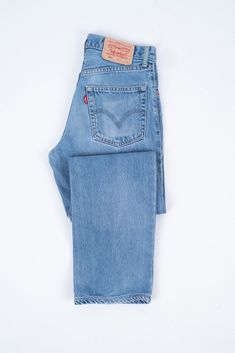 STYLE: 00505 0203. SIZE: label says W31/L31, fits W30/L30.5 (hemmed). MATERIAL: 100% cotton. COLOR: light blue. FEATURES: these classic straight leg Levi's 505 jeans in light blue wash feature zip fly and copper rivets, classic 5 pocket design, red tab on the back pocket, regular fit and high rise waist. Looks similar to the 501®, but with a zip-fly. This pair comes from the 90's what guarantees a premium quality denim that will serve a lifetime. Originally made for men, but fits perfectly women Fitted Light Blue Cotton Jeans, Classic Full Length Blue Jeans, Classic Light Wash Cotton Bottoms, Classic Washed Blue Cotton Jeans, Classic Blue Jeans For Spring, Classic Light Wash Cotton Jeans, Vintage Blue Jeans For Everyday, Classic Light Blue Cotton Bottoms, Basic Blue Bottoms For Everyday Wear