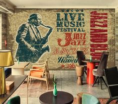 a living room filled with lots of furniture and walls covered in wallpaper that reads live music festival jazz jazz havana