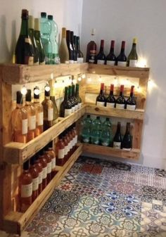 a wooden shelf filled with lots of bottles