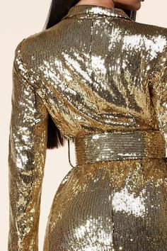 𝑫𝒆𝒔𝒄𝒓𝒊𝒑𝒕𝒊𝒐𝒏: Gold Sequins Mini Dress features a collared neckline and long sleeves with button cuffs. A relaxed bodice with two buttoning top flap pockets falls to a banded waist, atop a mini A-line skirt with oversized utility-inspired pockets. An exposed, function Model wearing size Small 𝑺𝒊𝒛𝒆 𝑪𝒉𝒂𝒓𝒕: • 2-4 Small • 6-8 Medium • 10-12 Large 𝑺𝒉𝒊𝒑𝒑𝒊𝒏𝒈 • This Item ships for free. 𝑹𝒆𝒕𝒖𝒓𝒏𝒔 • Returns (For store credit only) accepted within 30 days after your package Long Sleeve Sequin, Gold Sequins, Sequin Mini, Sequin Mini Dress, Custom Dresses, Blazer Dress, A Line Skirt, A Line Skirts, Dress Making