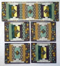 four quilted placemats with green and yellow designs on the sides, each one in different sizes