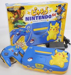 the nintendo 64 game console has pikachu on it's back and is in its original packaging