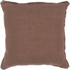 a brown pillow on a white background