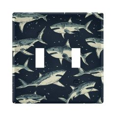 a light switch cover with sharks in the ocean on black and white wallpapers