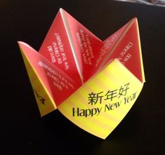 an origami new year's card with the words happy new year written on it