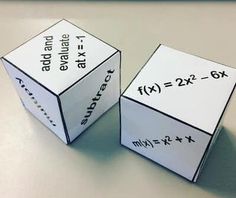 two cubes with numbers on them sitting next to each other