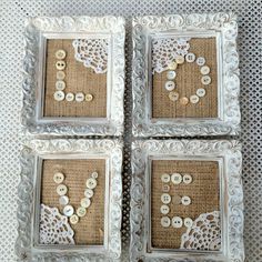 four framed pictures with buttons and lace on them