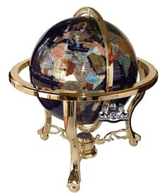 a gold plated metal and glass globe on stand with an intricately painted world map