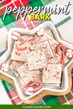 peppermint bark in a white bowl with candy canes on the side and text overlay that reads peppermint bark