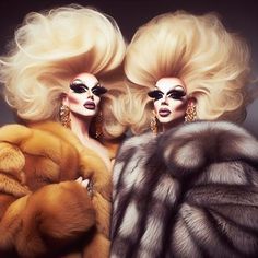 two women dressed in furs and black eyeliners are posing for the camera