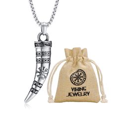 PRICES MAY VARY. Viking Horn Necklace, Norse-inspired jewelry, This horn necklace features a compass and Celtic knot, Nordic Elder Futhark Runes engraved on the horn pendant. This pendant is a beautifully crafted solid, polished finish, with 24 Inches Rolo stainless steel chain. This necklace will help you to bring out your Viking, warrior, and pagan soul. Product detail: Style: Viking Necklace for men, Size: 57.8*14mm Chain: 24" Rolo chain with stainless steel. lobster claw clasp. This Viking n Viking Necklace Men, Viking Horn, Horn Pendant Necklace, Vikings Gifts, Elder Futhark Runes, Futhark Runes, Arrowhead Necklace, Elder Futhark, Horn Jewelry