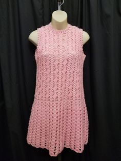 Vintage 1960s Joan Knits Light Pink Wool Crochet Sweater Sun Dress w Rayon Pink Slip. The dress has a back neckline zipper closure. Dress is in excellent condition...see pics!  Measurements: shoulder to shoulder 12, bust 34 stretch to 38, waist 30 stretch to 36, length 32 1/2, neck opening 5 inches. Retro Sleeveless Crochet Dress For Spring, Vintage Sleeveless Crochet Dress For Spring, Pink Cotton Crochet Dress, Pink Sleeveless Crochet Dress, Fitted Sleeveless Retro Crochet Dress, Retro Fitted Sleeveless Crochet Dress, Vintage Sleeveless Crochet Dress, 1960s Crochet Dress, Fitted Pink Sweater Dress, Knee-length