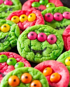 green and red cookies with faces painted on them