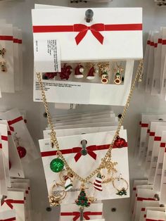 christmas jewelry is on display in a store