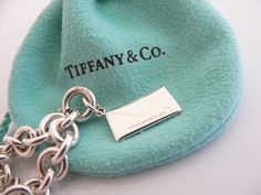 Offered for sale is a wonderful Tiffany and Co. Silver & "Sparkling" Diamond Envelope Charm bracelet. The piece is made from substantial and bright Tiffany silver, and yet retains a very feminine feel to it. Attached to its very substantial Tiffany Silver charm bracelet is a fantastic Envelope charm, accented with a gorgeous sparkling diamond. The charm is attached to the bracelet with a Sterling Silver Tiffany Clasp - this clasp opens and closes and thus can be used as a charm on a necklace Pink Tiffany And Co Charms, Tiffney And Co Jewelry, Sparkling Diamond, Silver Charm Bracelet, Tiffany Style, Tiffany And Co, Bracelet Charm, Pendant Bracelet, Tiffany Heart