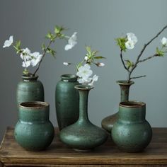 The Gohobi Handmade Ceramic Emerald Zen Vase adds a touch of vintage elegance to any home, with its stylish Japanese-style design that catches the eye and brings a classic touch of sophistication to any table decor. Handcrafted out of the finest ceramic, it is an exquisite piece of art that will bring beauty to any home. The price listed is for one vase or a set. Each piece is unique and high quality! As these are all handmade, they may be slightly different from one piece to another. We aim to Pottery Photoshoot, Ikebana Vases Ceramics, Pottery Accessories, Vase Forms, Art Floral Japonais, Vasos Vintage, Vintage Pottery Vases, Pottery Vases, Japanese Vase