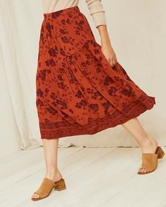 Whether you're headed to a meeting or to the market, keep the mood light and airy in this crêpe midi skirt. Fashioned with an elastic waist for pull-on ease and an angled seam for a unique and eye-catching twist.  Exclusive. Elastic waist. Angled pockets. Summer Rayon Gathered Skirt, Summer Viscose Maxi Skirt, Flowy Viscose Maxi Skirt For Summer, Summer Flowy Viscose Maxi Skirt, Summer Gathered Skirt In Rayon, Summer Viscose Flowy Maxi Skirt, Bohemian Midi Length Lined Skirt, Bohemian Style Lined Midi Skirt, Bohemian Midi-length Flowy Maxi Skirt