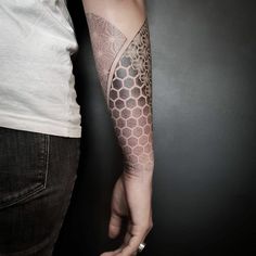 a person with a tattoo on their arm