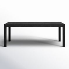 an empty black table on a white background with no one around it or someone else