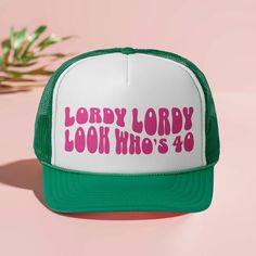 a green and white trucker hat with the words leroy lorry look who's 40 printed on it