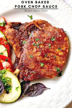 A pork Chop made with Oven Baked Pork Chop Sauce on a white plate with a salad beside it. Pioneer Woman Pork Chops, Breakfast Pork Chops, Grilled Pork Chops Marinade, Pork Chop Sauce, Center Cut Pork Chops, Baked Pork Chops Oven, Pork Chop Recipes Baked, Chop Recipes, Fried Pork Chops